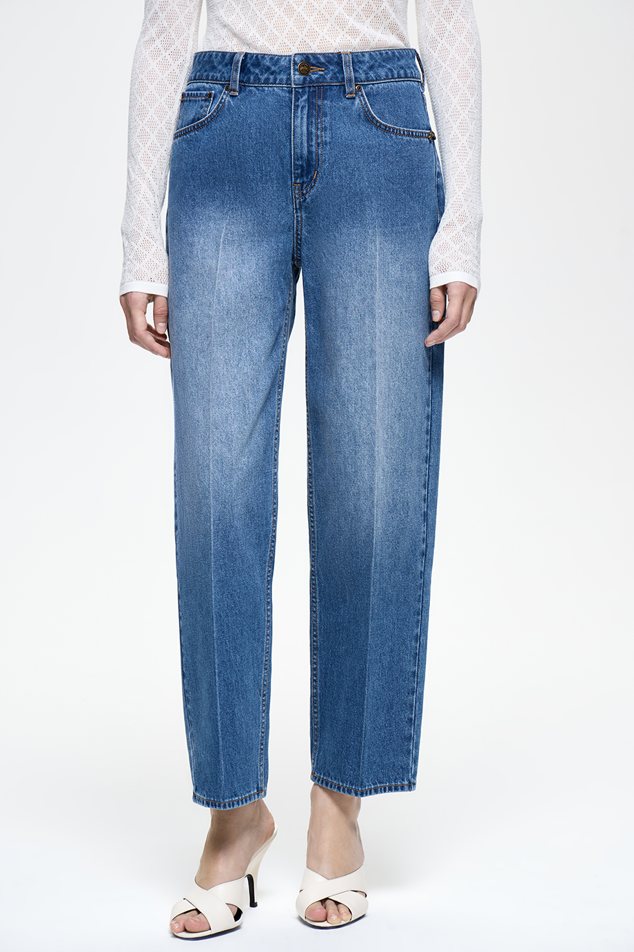 Джинсы Tapered Fit